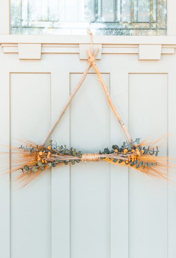 Make this easy and inexpensive nature inspired twig wreath perfect for fall! I have a step by step video tutorial as well!