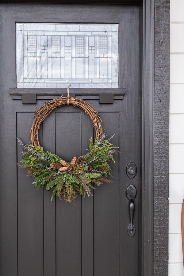 How to make a gorgeous winter wreath perfect to use all season, well into the spring. This is a full tutorial with video on how to make one!
