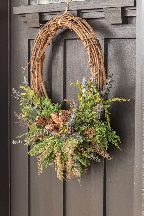 How to make a gorgeous winter wreath perfect to use all season, well into the spring. This is a full tutorial with video on how to make one!