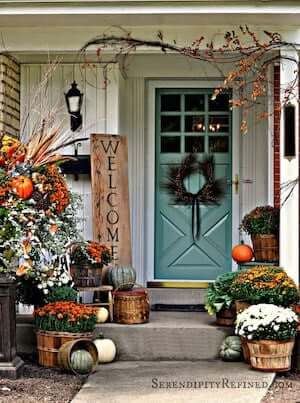 https://e5s8762easd.exactdn.com/wp-content/uploads/2022/08/Fall-autumn-porch-decorating-idea-welcome-sign-mums-pumpkins-orange-turquoise-white.jpeg?strip=all&lossy=1&resize=600%2C806&ssl=1