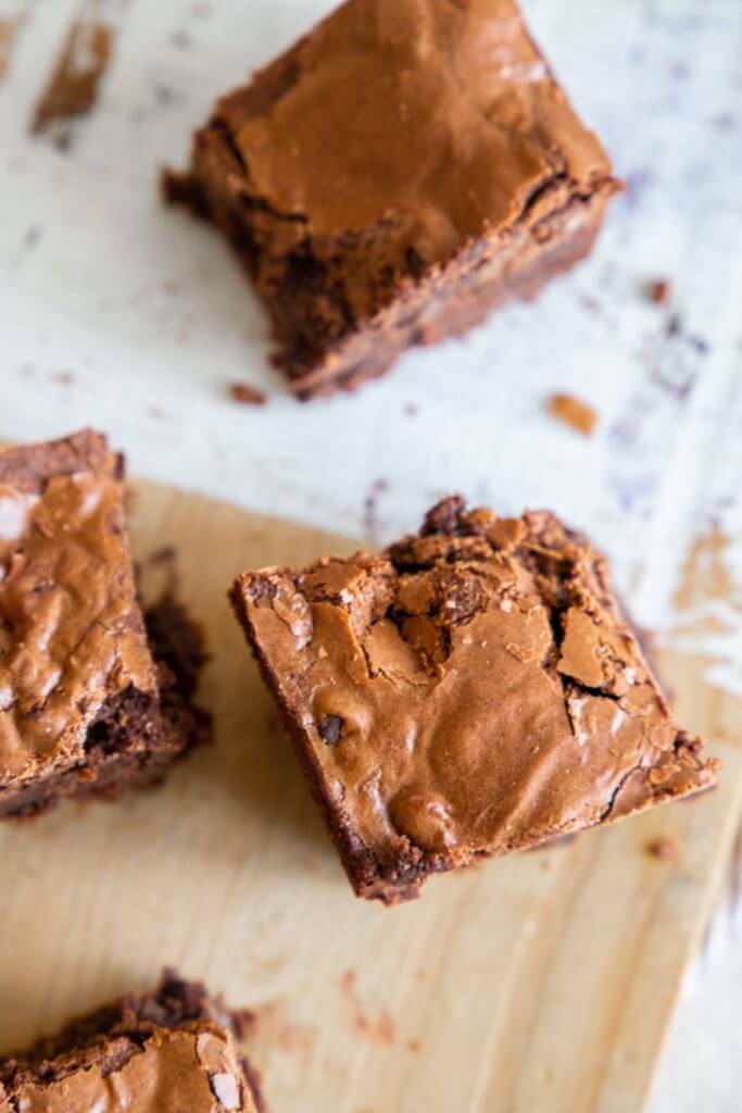 Easy recipe for the best fudgy sourdough discard brownies. These sourdough brownies are amazing! They are easy to make too! With a deep chocolatey base and  t touch of sourdough tang, this gooey and fudgy sourdough brownie recipe is the perfect balance, is easy to make, and tastes amazing!