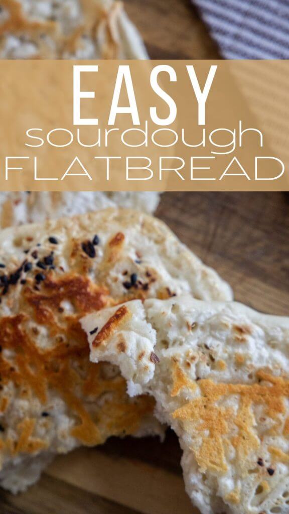 Make this easy 2 ingredient sourdough flatbread recipe. It is quick and easy, can be made in 5 minutes and has all the benefits of sourdough.  Top with your favorite seasonings and enjoy!