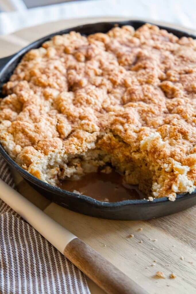 This decadent sourdough apple cobbler dessert is one of our favorites! It is a great way to use sourdough discard. With a soft biscuit topping and spiced apple filling it screams fall.