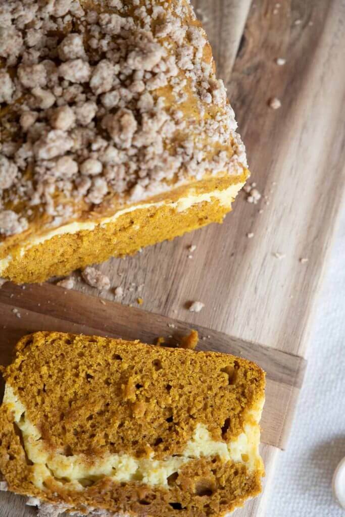 How to make easy pumpkin bread with cream cheese filling. This pumpkin bread is the perfect fall treat with a surprise on the inside!