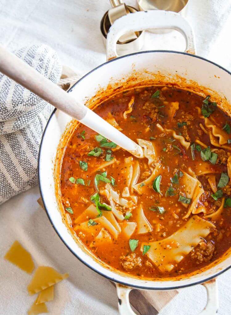 Make this easy lasagne soup on a busy weeknight or a cozy day indoors. It’s so easy to make and the flavor is amazing. It has spicy Italian sausage and broken lasagne noodles. The combination with herbs like rosemary, basil and oregano gives this the ultimate flavor too! Did I say it can be made in 30 minutes?