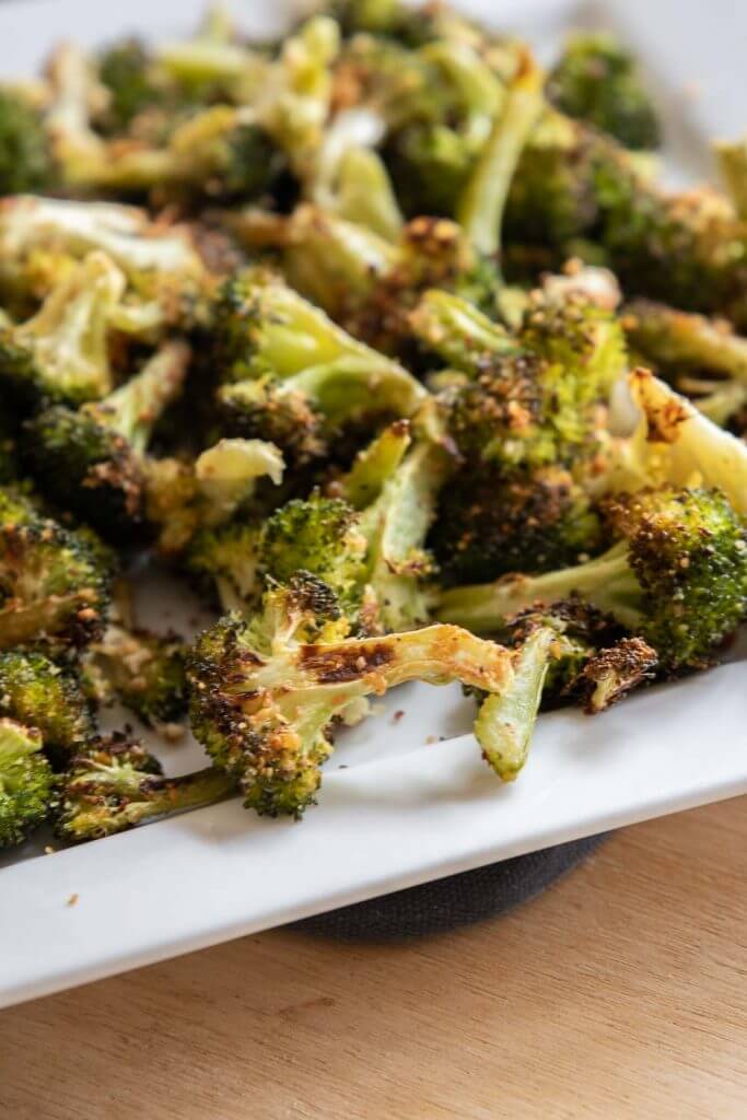 Make this easy roasted broccoli with parmesan as your next side dish. This is an easy side dish that can be made in about 25 minutes!