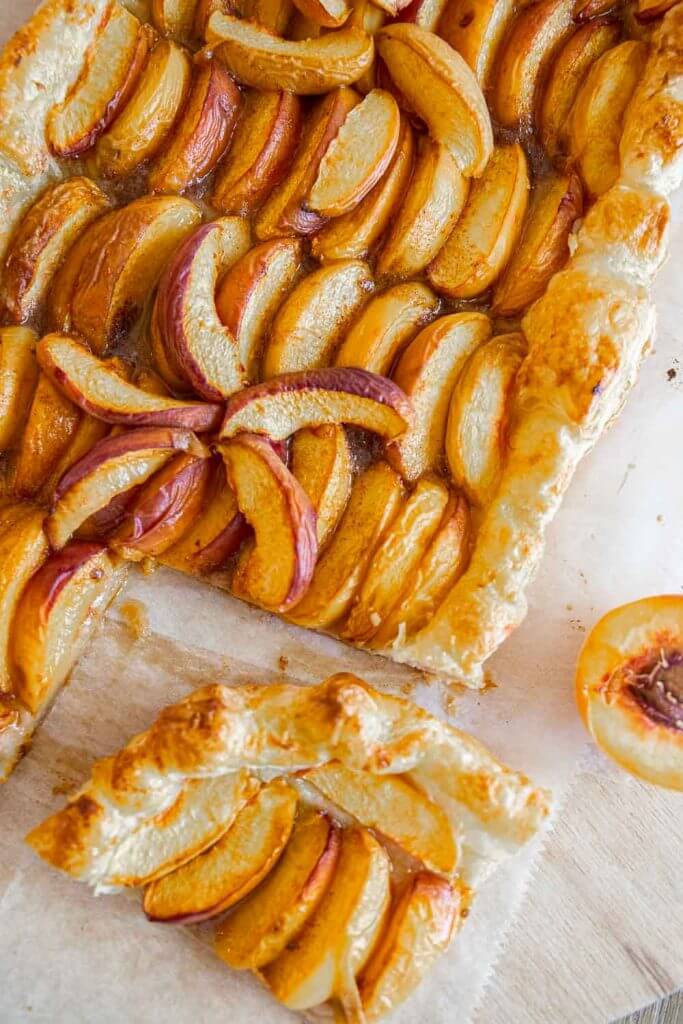 Make this easy peach tart using puff pastry ASAP! This peach puff pastry dessert is the perfect balance of sweet, buttery, tart goodness!