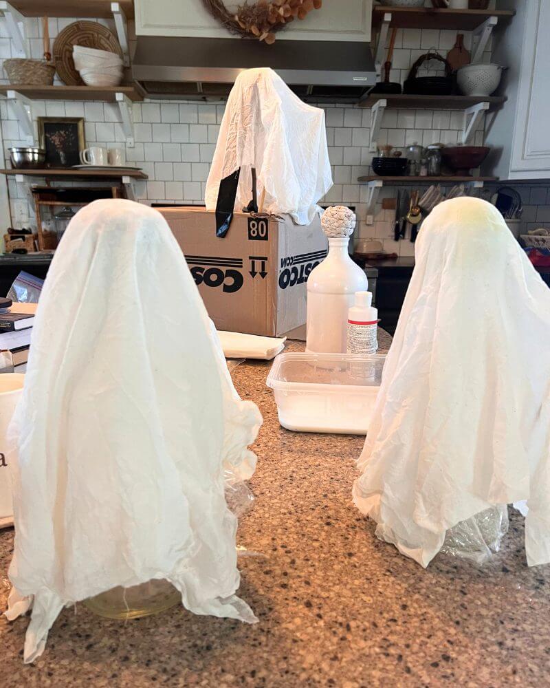 Make these adorable cheesecloth ghosts and add them to your Halloween decor! Its a great Halloween craft to involve kids or do on your own.