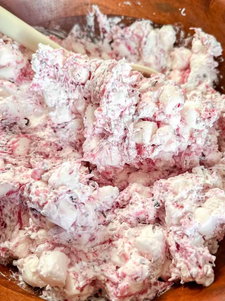 Make this easy cranberry fluff salad as a yummy side for your holiday meals! its super easy to make and has simple ingredients!