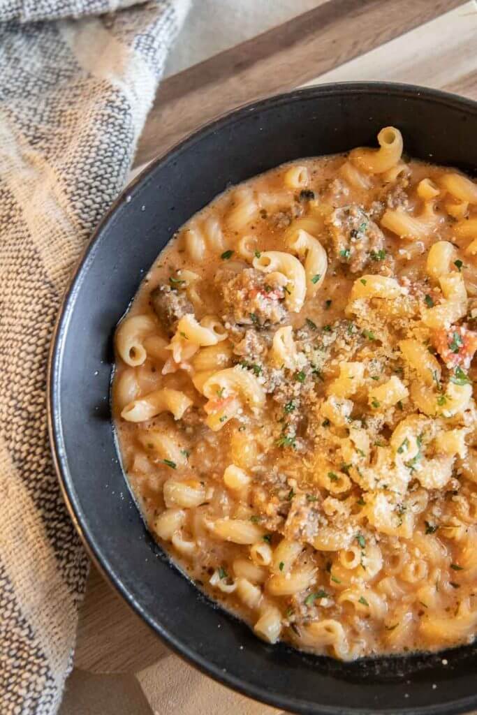This creamy Italian sausage soup is an amazing dinner you can make in under 30 minutes. It is full of flavor and so hearty.