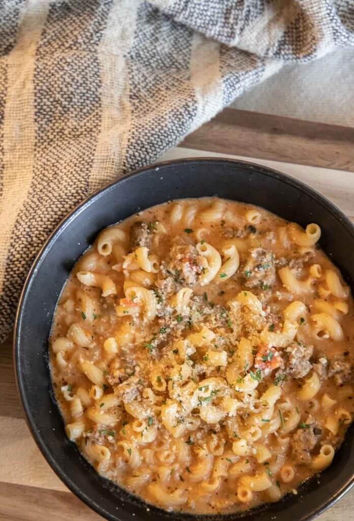 This creamy Italian sausage soup is an amazing dinner you can make in under 30 minutes. It is full of flavor and so hearty.