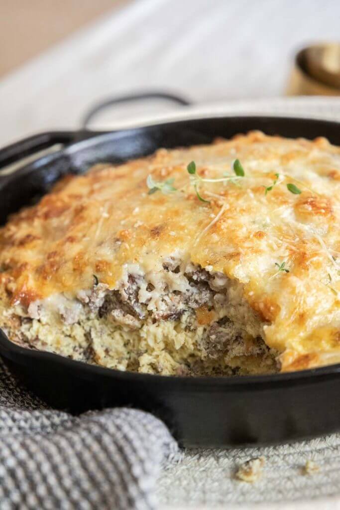 This amazing sourdough bread and egg bake is one of our most favorite meals! With day old bread, sausage and cheese its the perfect breakfast!