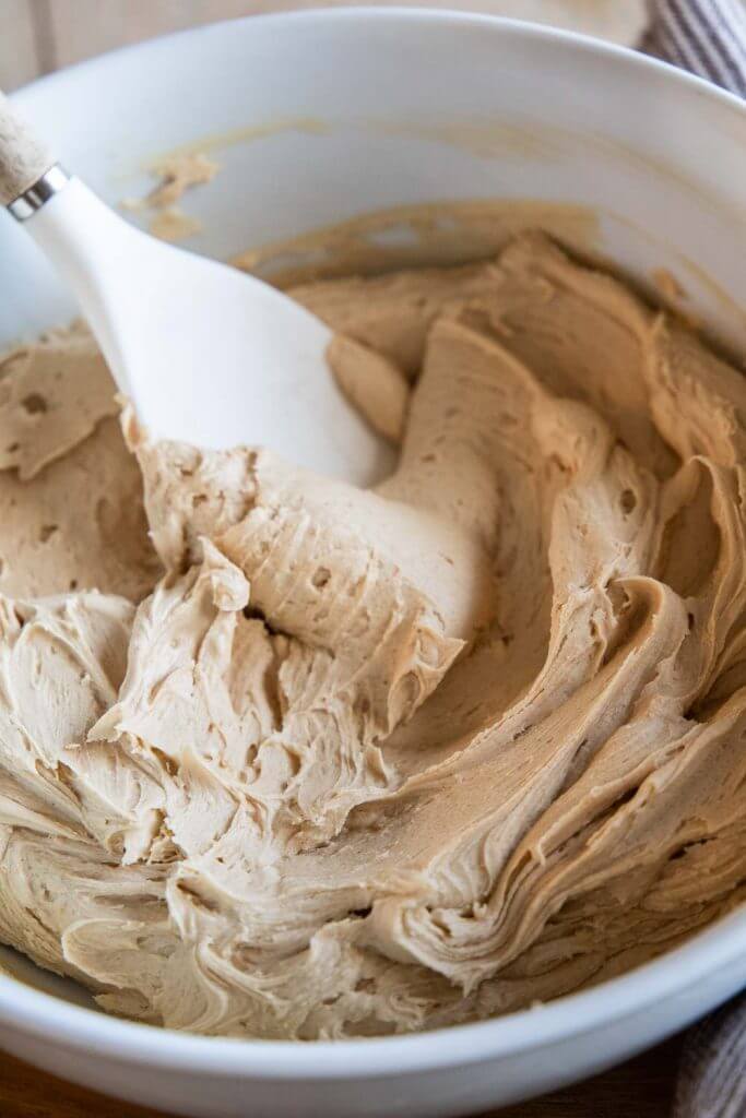 This peanut butter frosting is super easy to make and tastes amazing! Skip the store bought and make this fluffy peanut butter frosting.