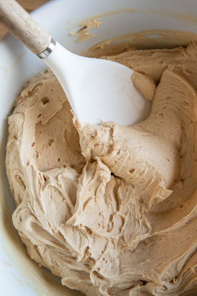 This peanut butter frosting is super easy to make and tastes amazing! Skip the store bought and make this fluffy peanut butter frosting.