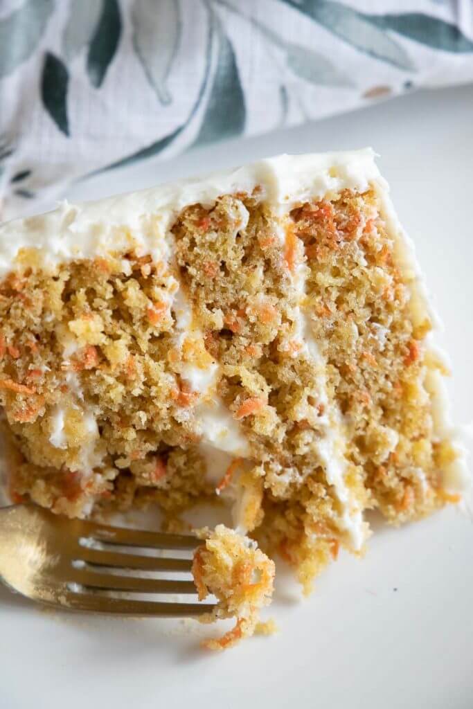Make this amazing sourdough discard carrot cake! Its the perfect carrot cake, sweet and flavorful with a tender, moist crumb. This sourdough carrot cake is flavorful and perfectly balanced with the cream cheese icing.