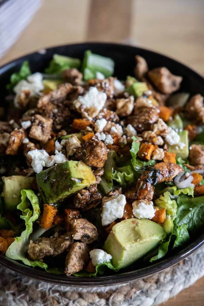 This balsamic chicken salad is packed with protein and amazing flavors with sweet potatoes, avocado, feta cheese and shallots.