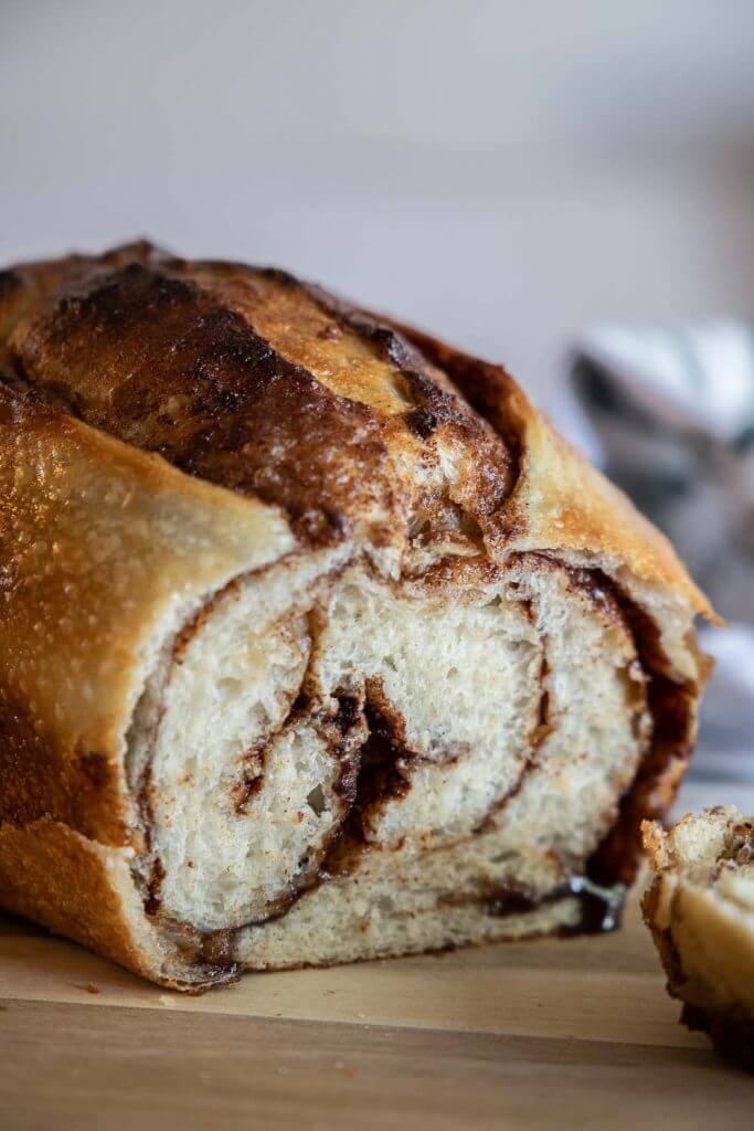 This cinnamon sugar sourdough bread is incredible! The cinnamon sugar mixture adds sweetness and flavor! The gooey cinnamon swirls with the fluffy soft sourdough bread is incredible. Get the recipe here!