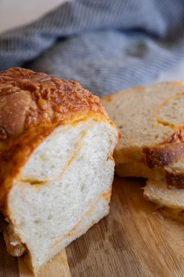 Make this amazing sourdough cheese bread. Its easy to make and the combination of the bread with the salty sharp cheese is perfection! This bread does not need much work, and the reward of a soft bread with cheesy goodness makes this such a good bread.