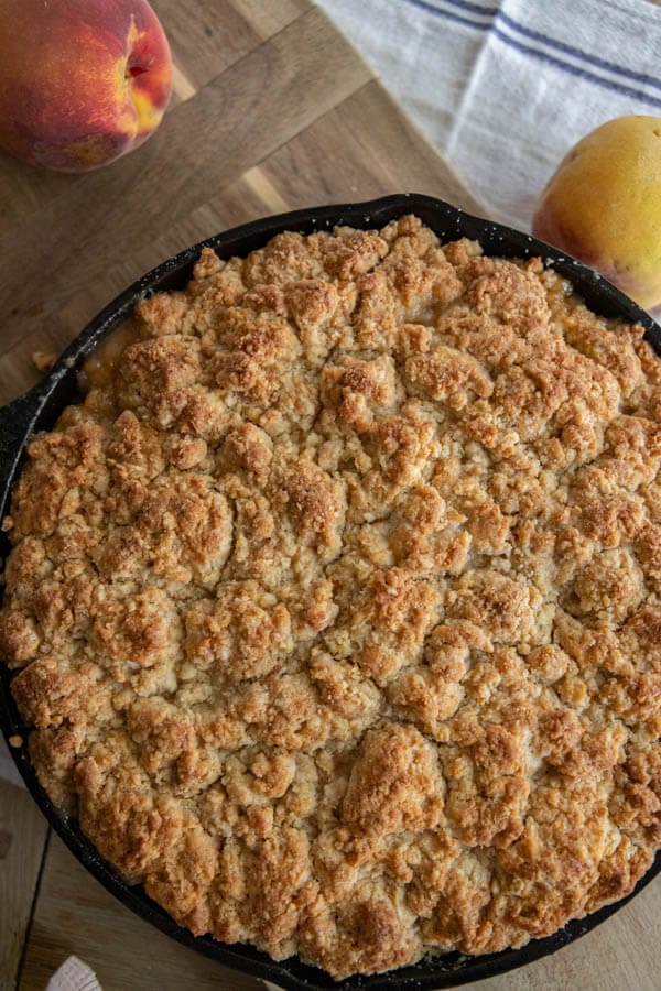 Make this amazing sourdough peach cobbler! It is a great way to use up sourdough discard and make an amazing dessert