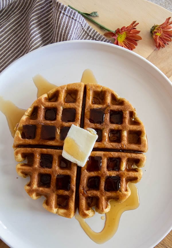 Make these amazing sourdough pumpkin waffles using sourdough discard. You can make these the night before to create true sourdough waffles or whip them up in the morning and enjoy them right away! They are sweet and spicy, the perfect pumpkin breakfast for fall.