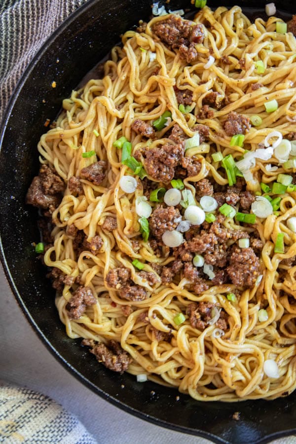 These szechuan beef noodles are one of our favorite weeknight meals. They are so easy to make and taste amazing! They are ready in under 30 minutes and are the ultimate comfort food.