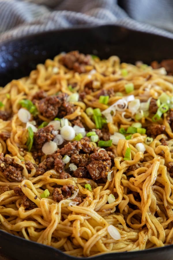 These szechuan beef noodles are one of our favorite weeknight meals. They are so easy to make and taste amazing! They are ready in under 30 minutes and are the ultimate comfort food.