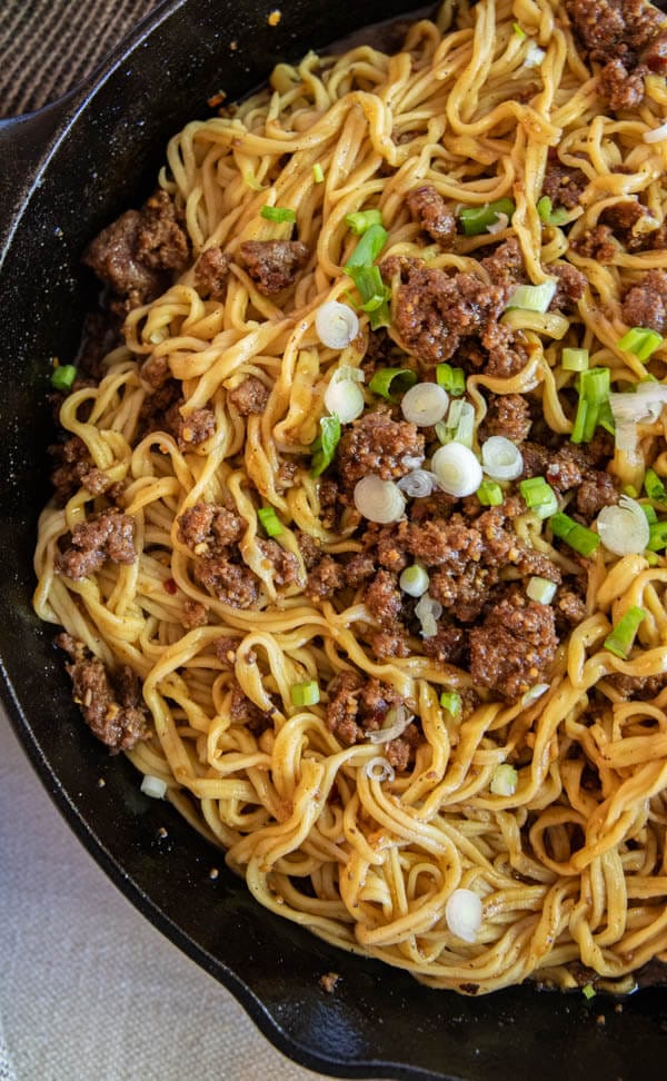 These szechuan beef noodles are one of our favorite weeknight meals. They are so easy to make and taste amazing! They are ready in under 30 minutes and are the ultimate comfort food.