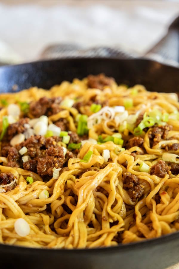 These szechuan beef noodles are one of our favorite weeknight meals. They are so easy to make and taste amazing! They are ready in under 30 minutes and are the ultimate comfort food.