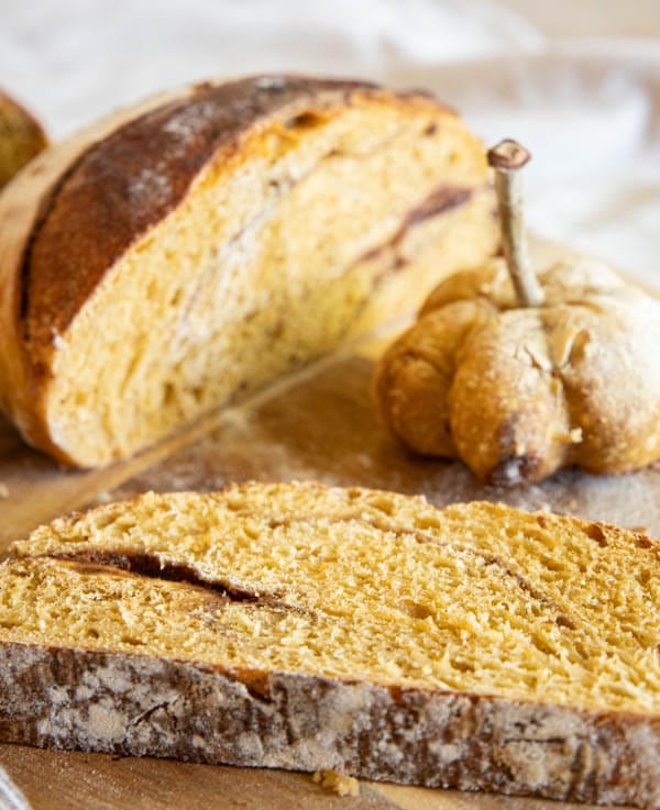 This is an amazing fall treat! This is a fun take on regular dutch oven sourdough bread, but with all the pumpkin spice flavors! Enjoy this bread a french bread, toasted with butter or even with a sweet honey butter!