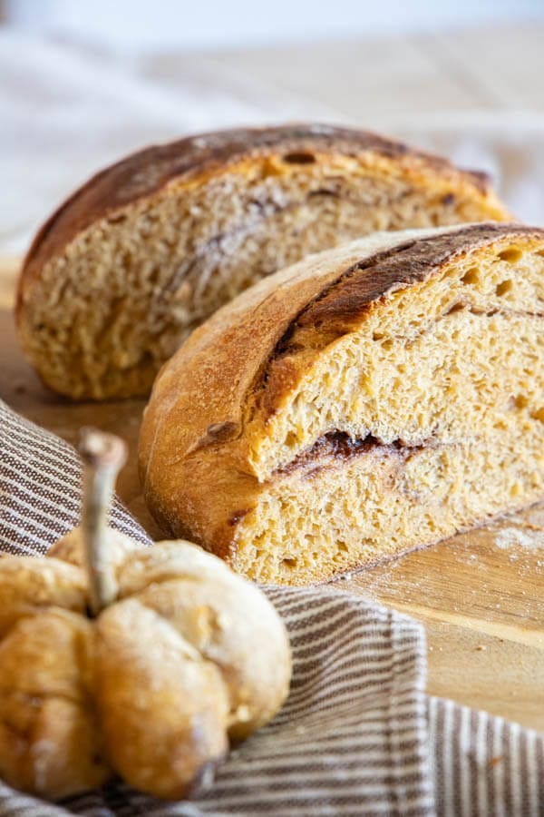 This is an amazing fall treat! This is a fun take on regular dutch oven sourdough bread, but with all the pumpkin spice flavors! Enjoy this bread a french bread, toasted with butter or even with a sweet honey butter!