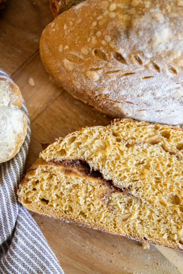 This is an amazing fall treat! This is a fun take on regular dutch oven sourdough bread, but with all the pumpkin spice flavors! Enjoy this bread a french bread, toasted with butter or even with a sweet honey butter!